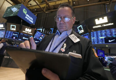 Dow futures slump, Nasdaq ticks higher as Wall Street assesses Fed's 2025 rate path