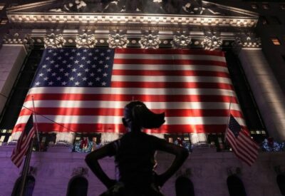 The ‘Fearless Girl’ sculpture stands in front of the New York Stock Exchange