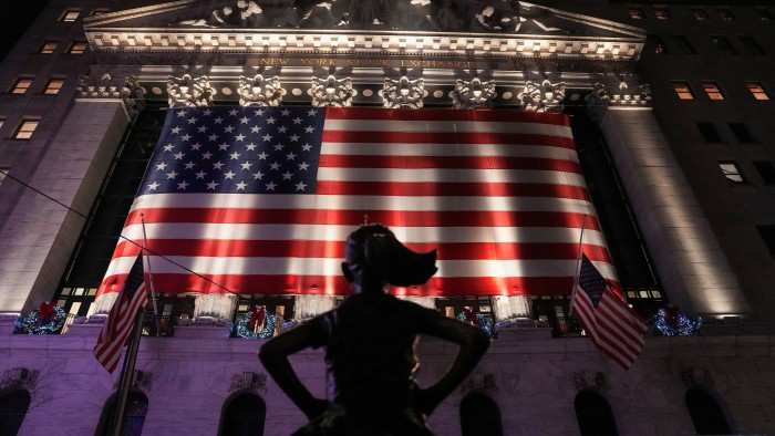 The ‘Fearless Girl’ sculpture stands in front of the New York Stock Exchange