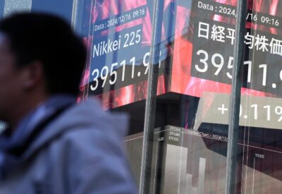 Stock market today: Asian shares are mixed after Nasdaq sets a record ahead of Fed meeting