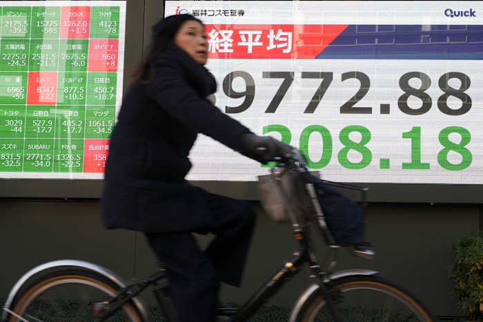 Asian stocks follow Wall Street's retreat, oil prices surge