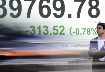 Stock market today: Asian shares slip after Wall St slumps despite strong US economic data