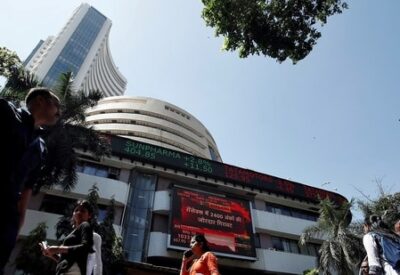 Stock market crash: People walk past the Bombay Stock Exchange (BSE) building in Mumbai, India, March 9, 2020(Francis Mascarenhas/Reuters)