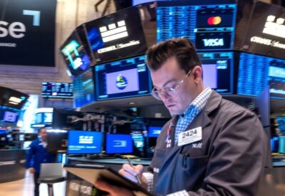 Trader on floor of the New York Stock Exchange